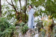 Woman Enjoying Nature in Light Blue Kimono