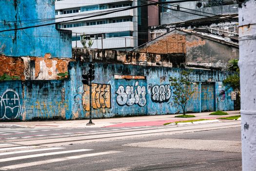 Colorful graffiti art on an urban wall in Santos, São Paulo, showcasing street culture.