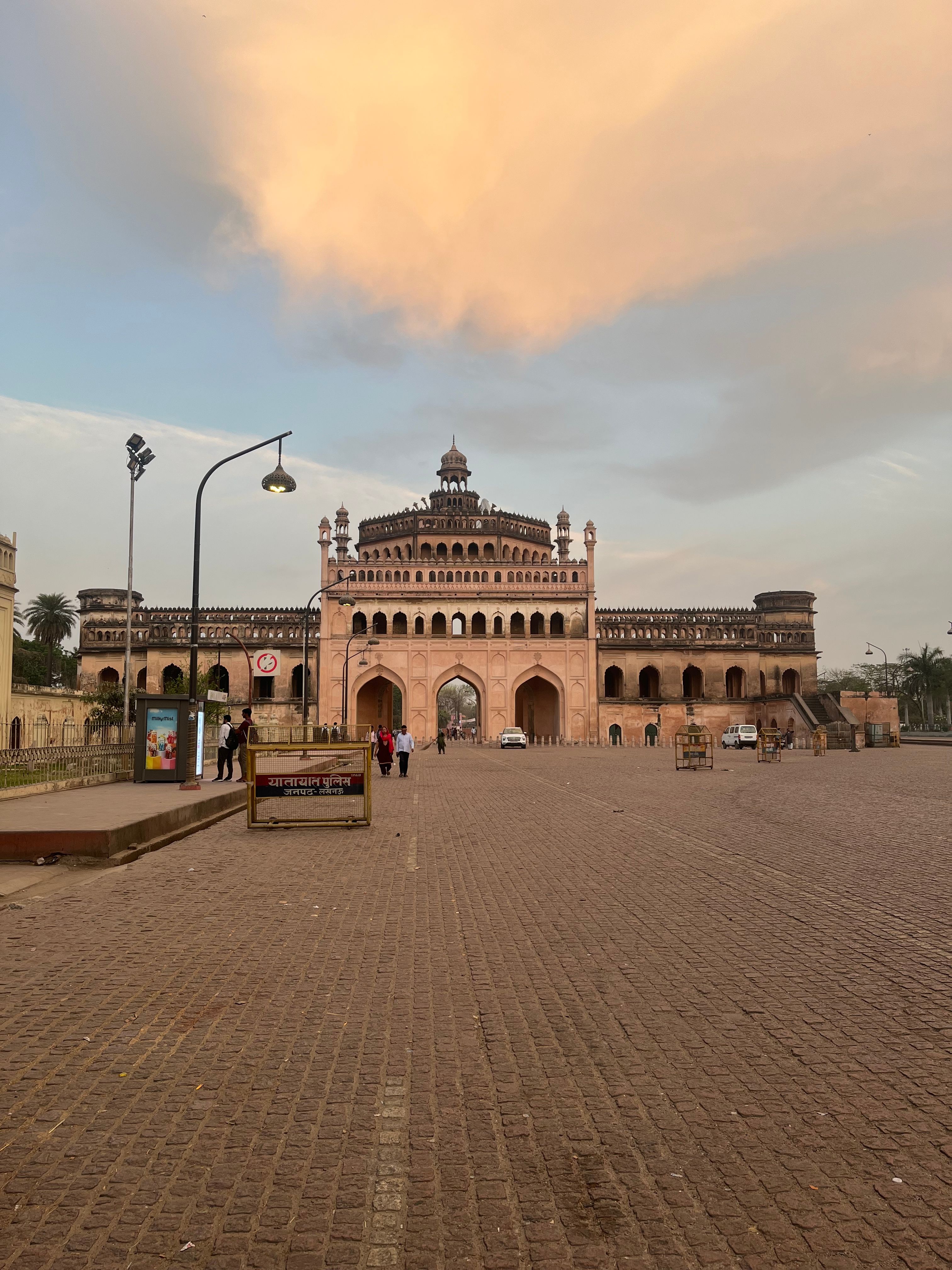 The majestic Bara Imambara in Lucknow, India, captured during a serene sunset, showcasing its impressive Mughal architecture.