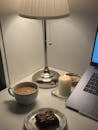 Cozy Desk Setup with Coffee and Brownie