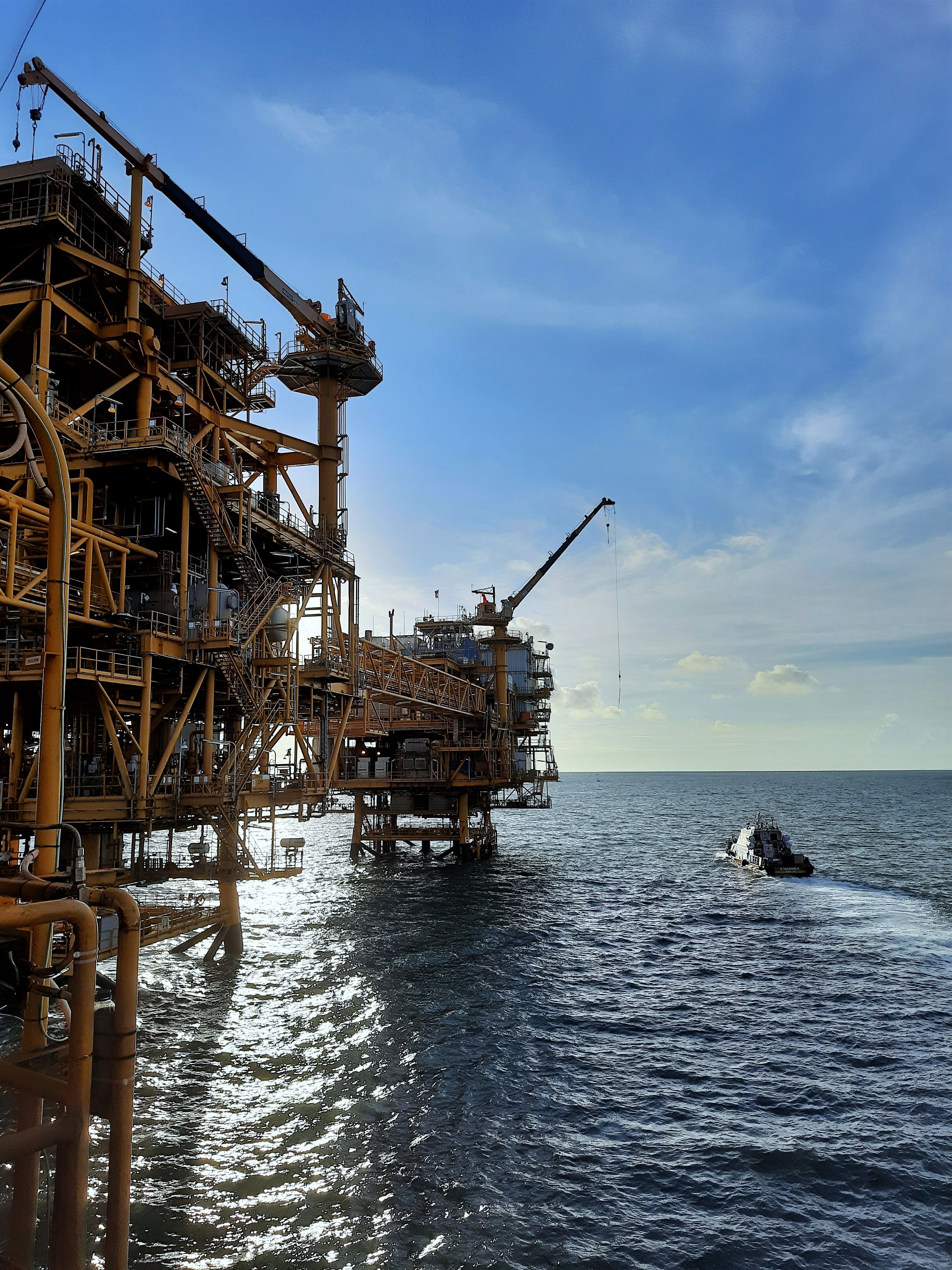 Offshore Oil Rig at Sunset Aerial View · Free Stock Photo