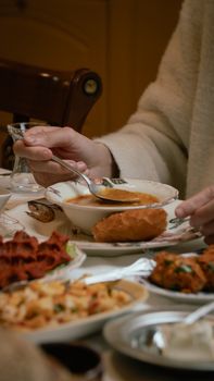 A traditional Turkish meal featuring soup and various dishes in Gaziantep, Türkiye.