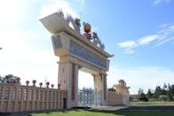 Entrance Gate of Cao Dai Temple under Blue Sky