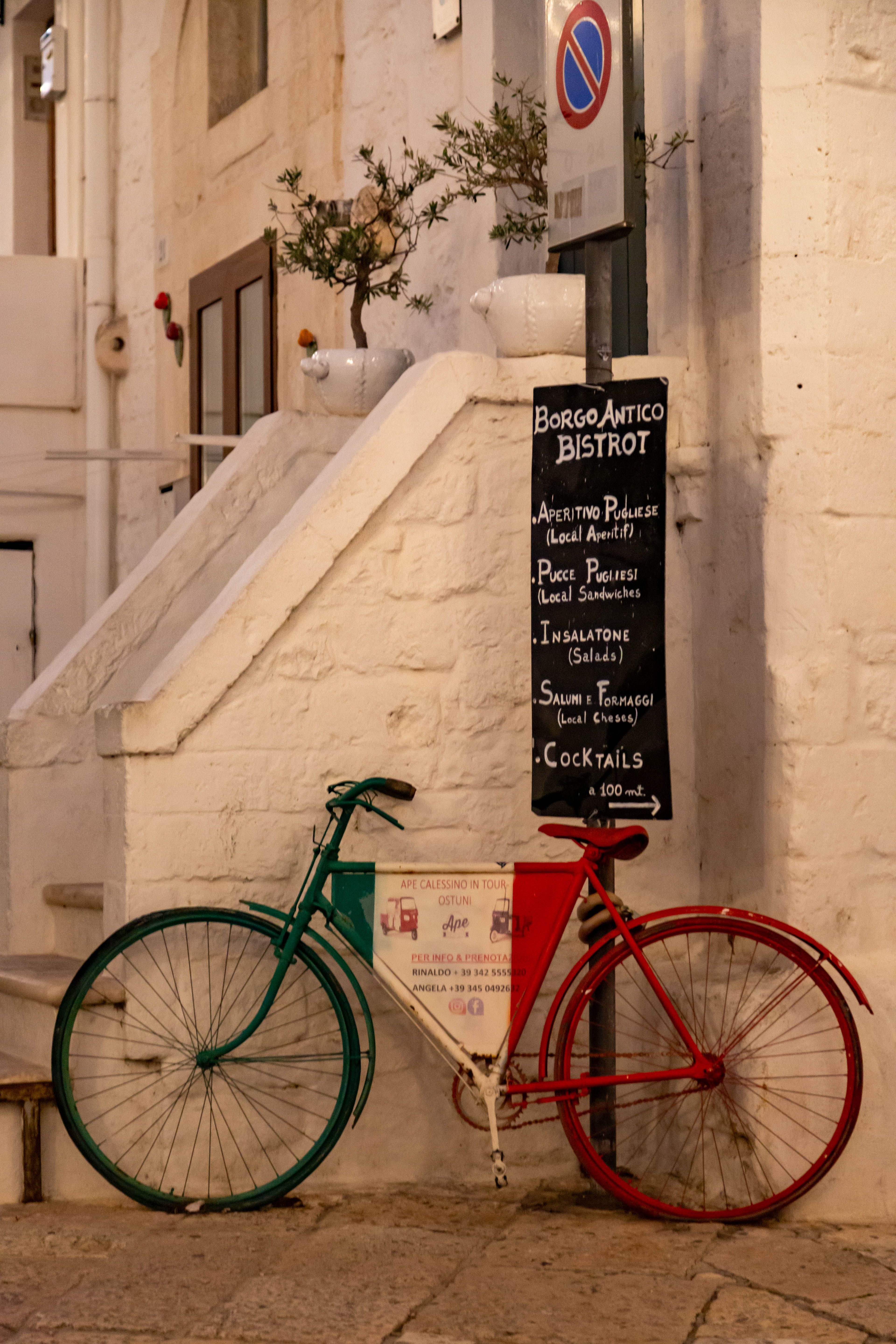 Colorful Bicycle and Bistro Sign in Bari, Italy · Free Stock Photo