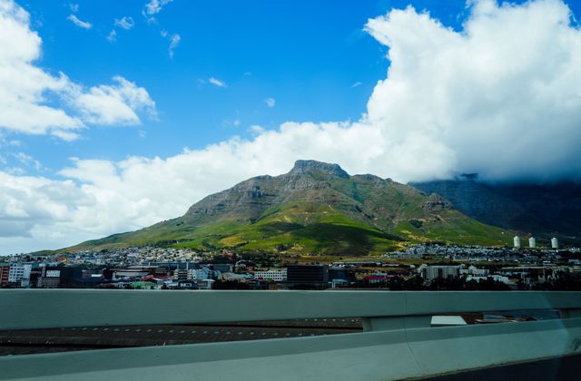 Stunning landscape of Cape Town's iconic Table Mountain under a bright blue sky. — arriving in Cape Town