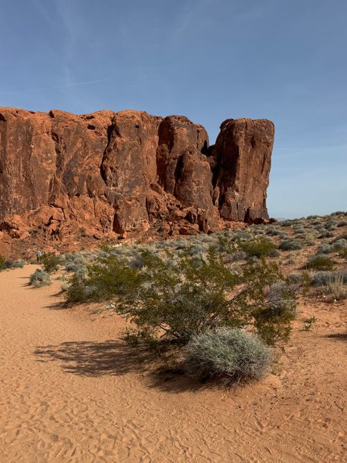 Free Scenic view of a striking red rock formation in the Moapa Valley desert landscape. Stock Photo