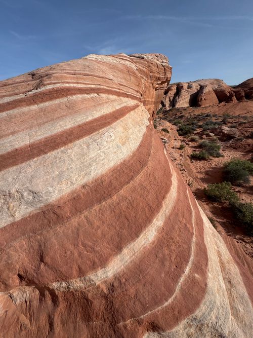 Free Stunning striped red rock formations in Moapa Valley, Nevada under a clear blue sky. Stock Photo