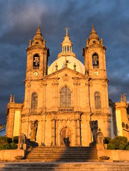 Stunning view of Bom Jesus do Monte Basilica in Braga, Portugal during golden hour.