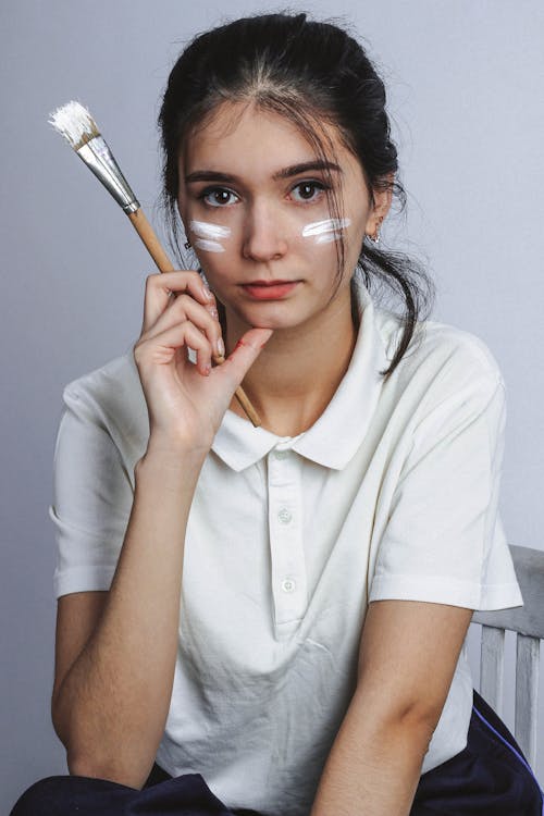 Free Photo of Girl Holding Paint Brush Stock Photo