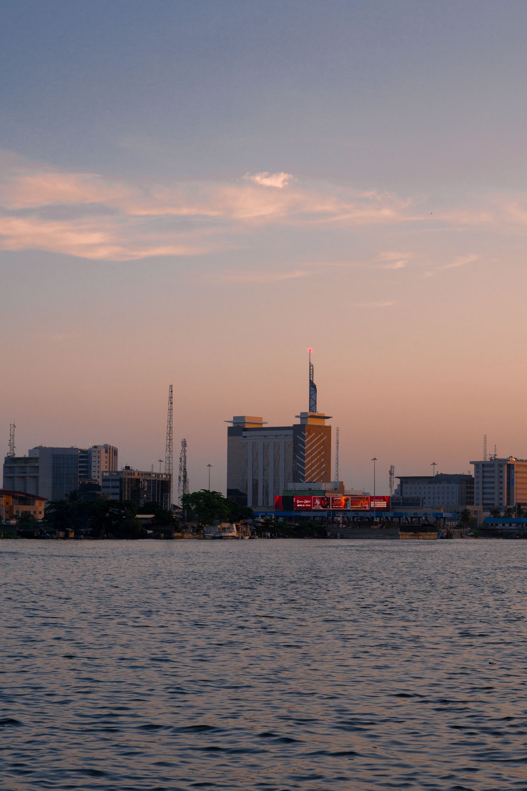 Lagos skyline at sunset over water