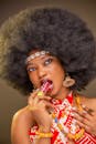 Portrait of Woman with Afro and Traditional Attire