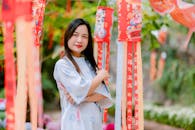 Young Woman Celebrating Lunar New Year Outdoors
