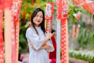 Woman Celebrating Chinese New Year Outdoors