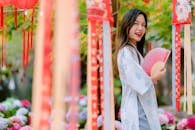 Woman Celebrating at Vibrant Lantern Festival