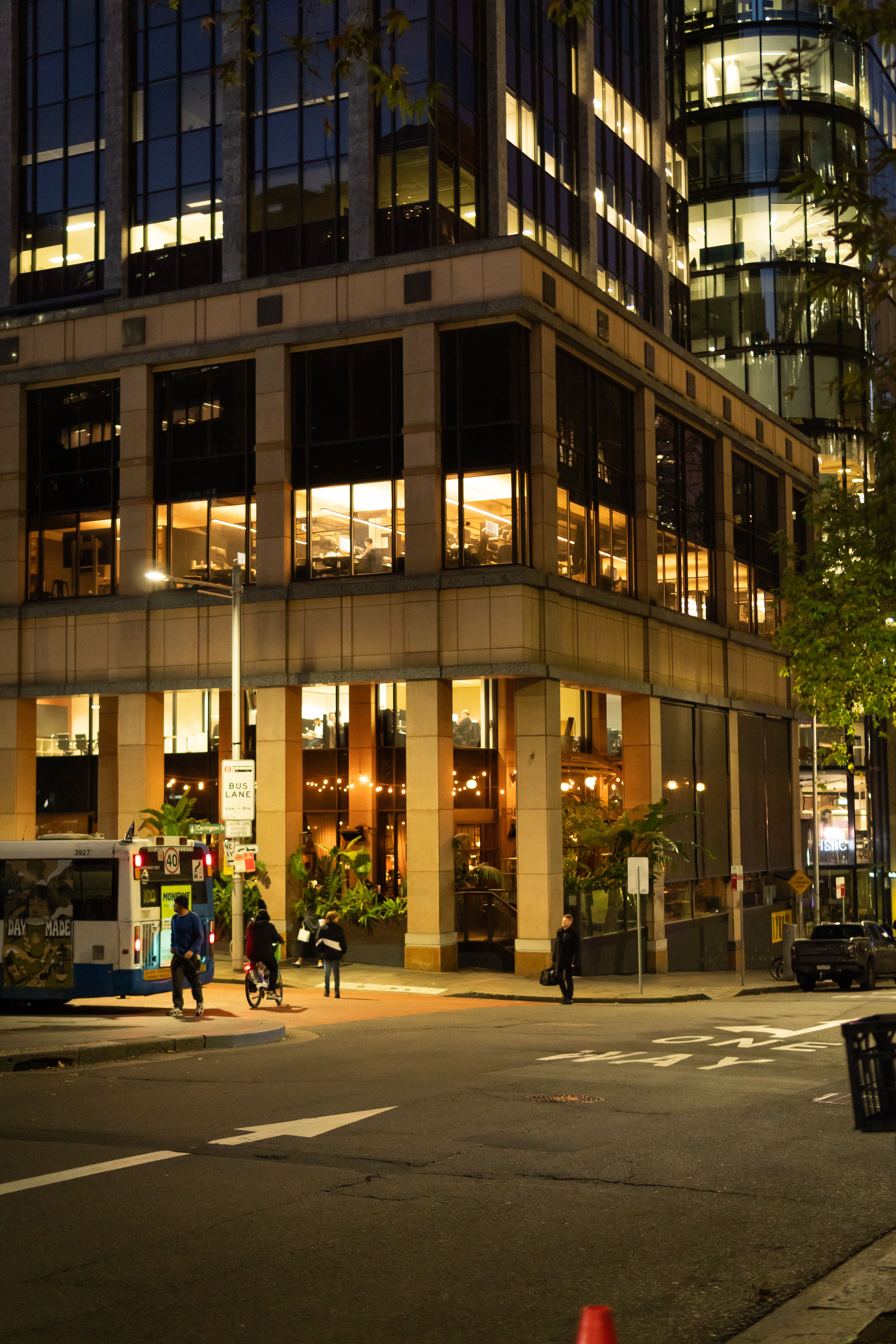 Modern City Street at Night with Office Building · Free Stock Photo