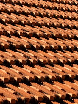 Close-up view of terracotta roof tiles creating a pattern in Ho Chi Minh City.