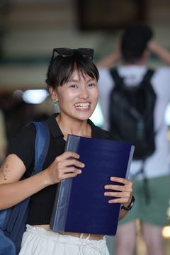 Student holding a notebook, photo by Tue Simon on Pexels