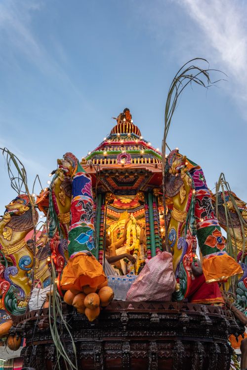 Free Colorful Indian chariot adorned with intricate decorations during a traditional festival Stock Photo