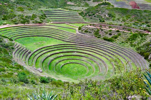 Stunning aerial view of Moray terraces showcasing ancient Incan agricultural technique in Peru.