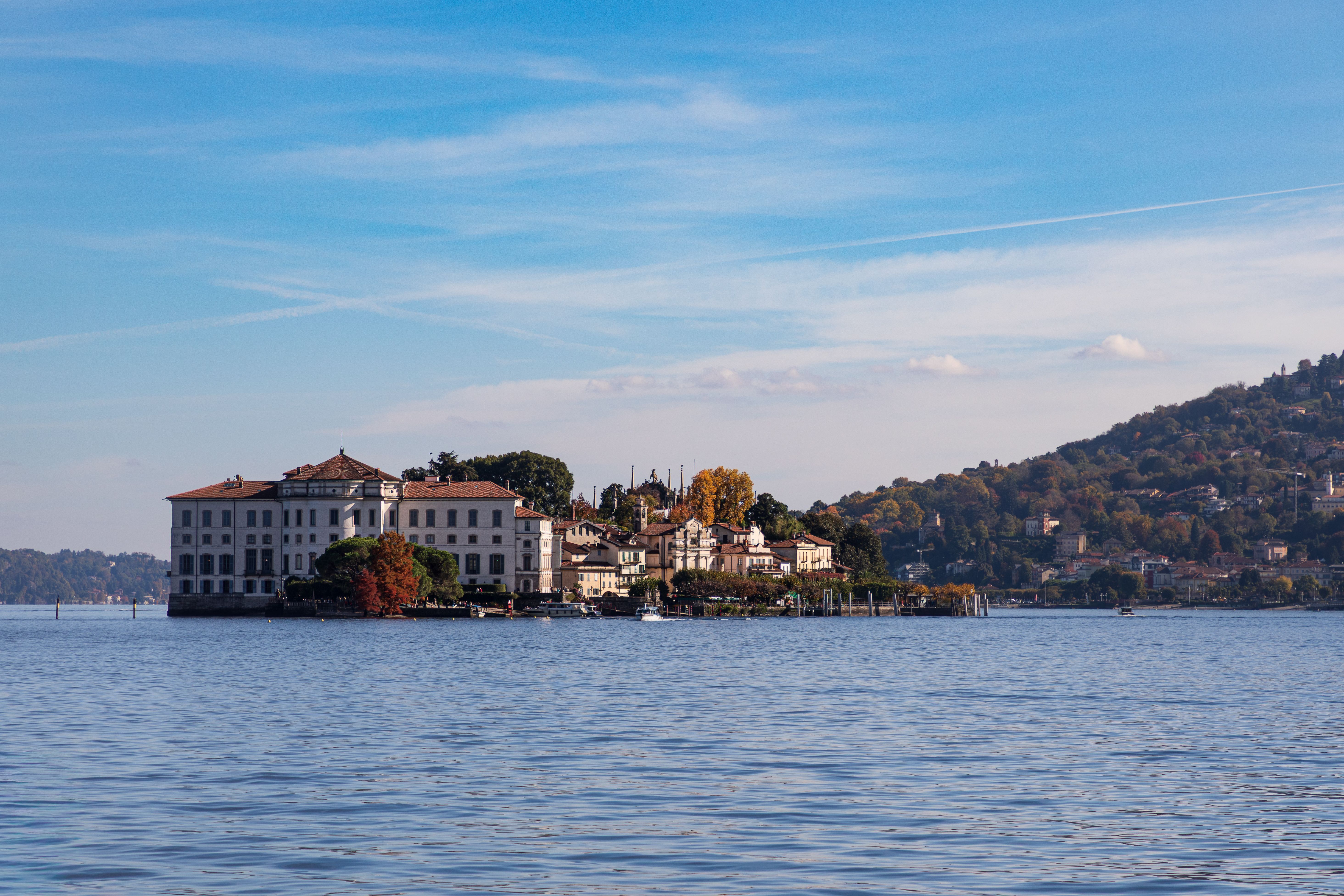 Beautiful view of Isola Bella on Lake Maggiore, Italy, with clear blue skies and serene waters. Beautiful view of Isola Bella on Lake Maggiore, Italy, with clear blue skies and serene waters.