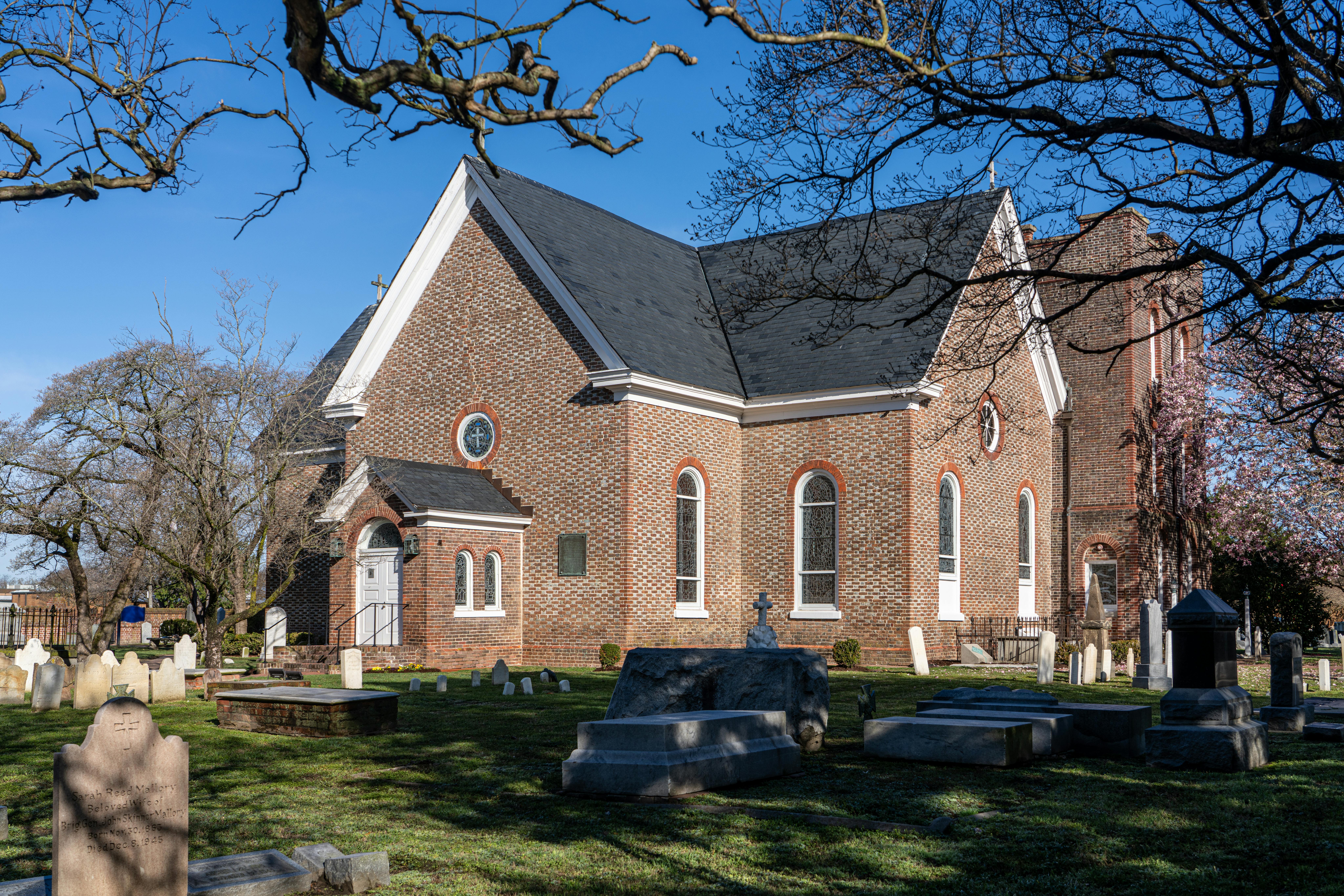 Interior of Galle Dutch Reformed Church with colonial gravestones as floor tiles and wooden pews
