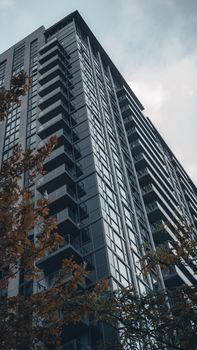 Dramatic view of a modern high-rise residential building in Mississauga, Ontario.