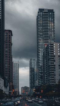 Explore the vibrant urban landscape of Mississauga, captured under a moody, dramatic sky.