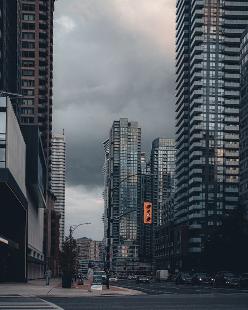 Free A dramatic view of Mississauga's modern skyline under a stormy sky, capturing urban life. Stock Photo