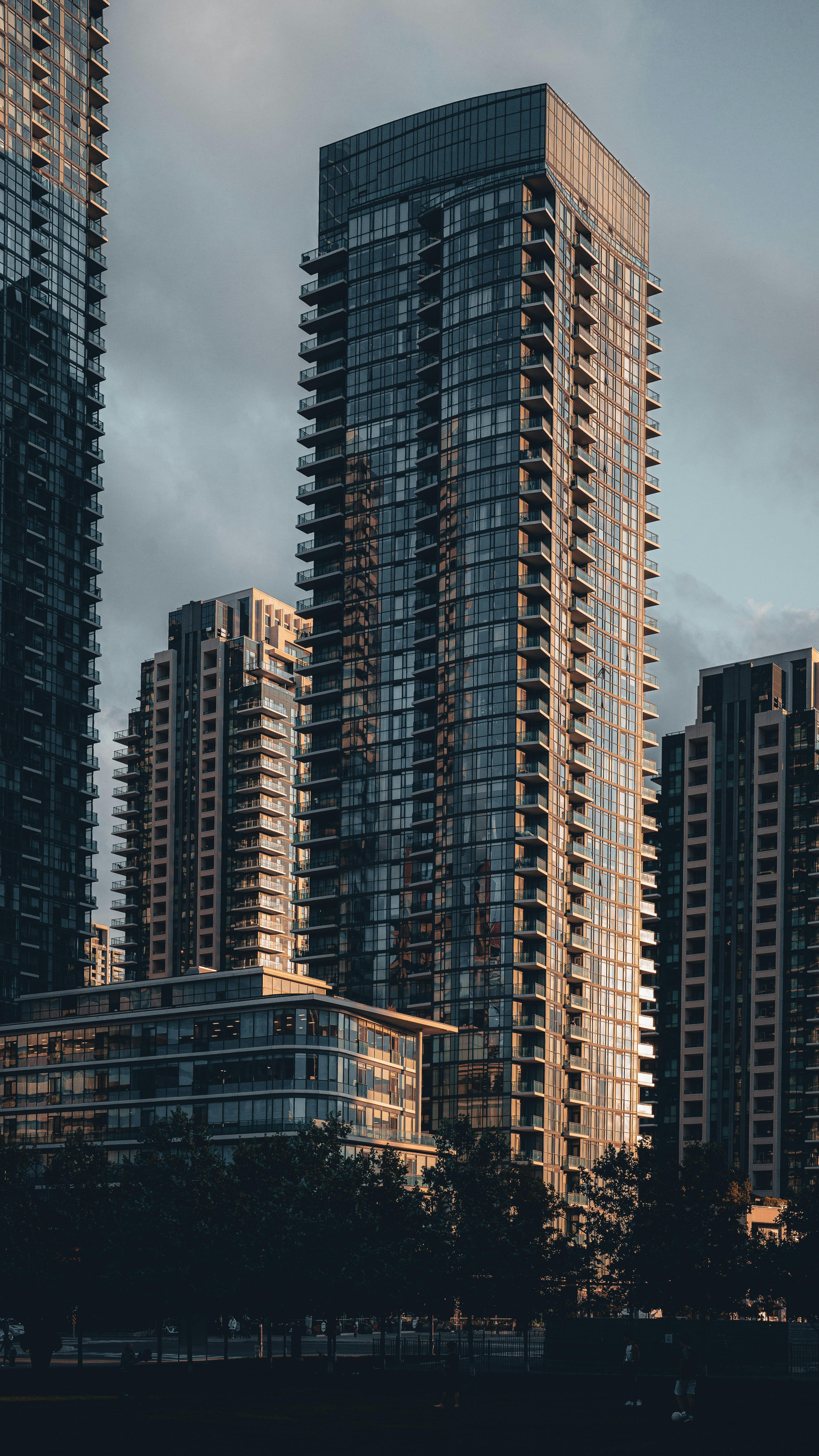 High-rise buildings in Mississauga, Ontario, during twilight with dramatic skies.