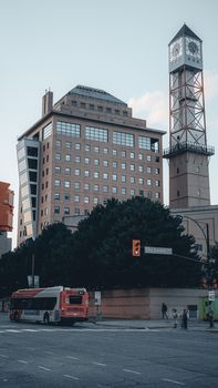 Explore the vibrant cityscape of Mississauga with modern architecture and bustling street life.
