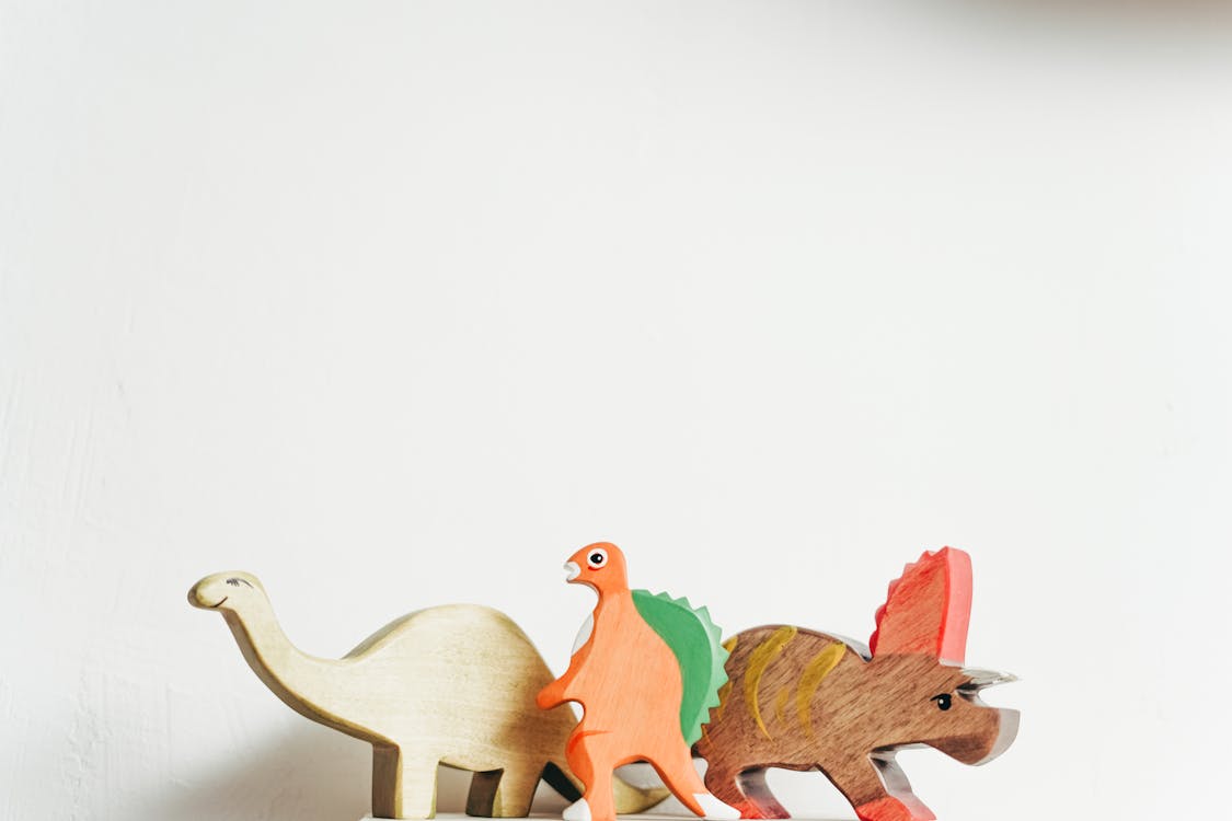 Free Wooden Dinosaur in White Backgroud Stock Photo