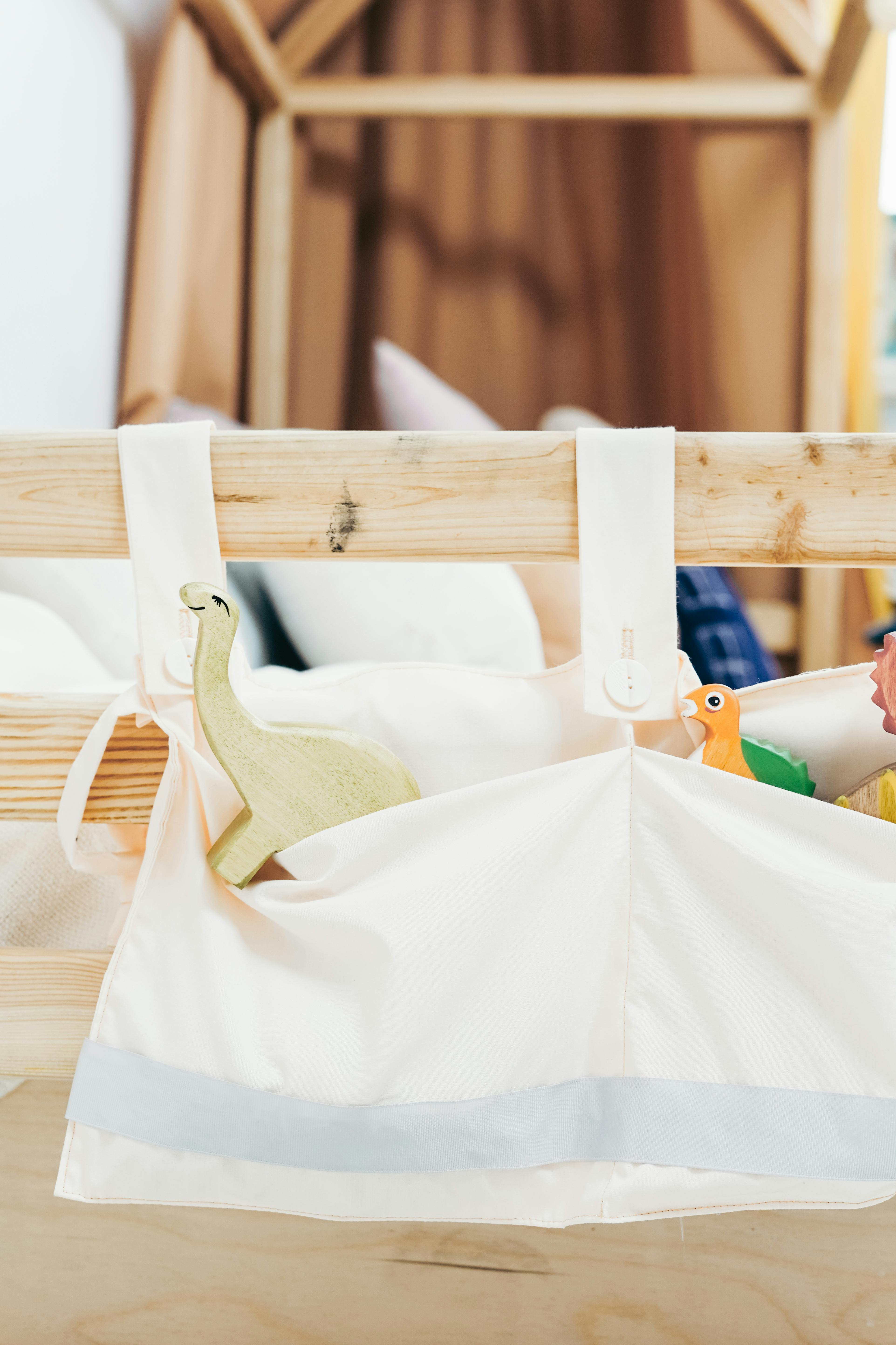 wooden bed frame with toys