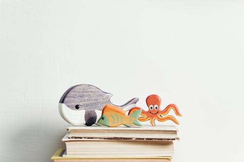 Free Wooden Toys on Top of the Books Stock Photo