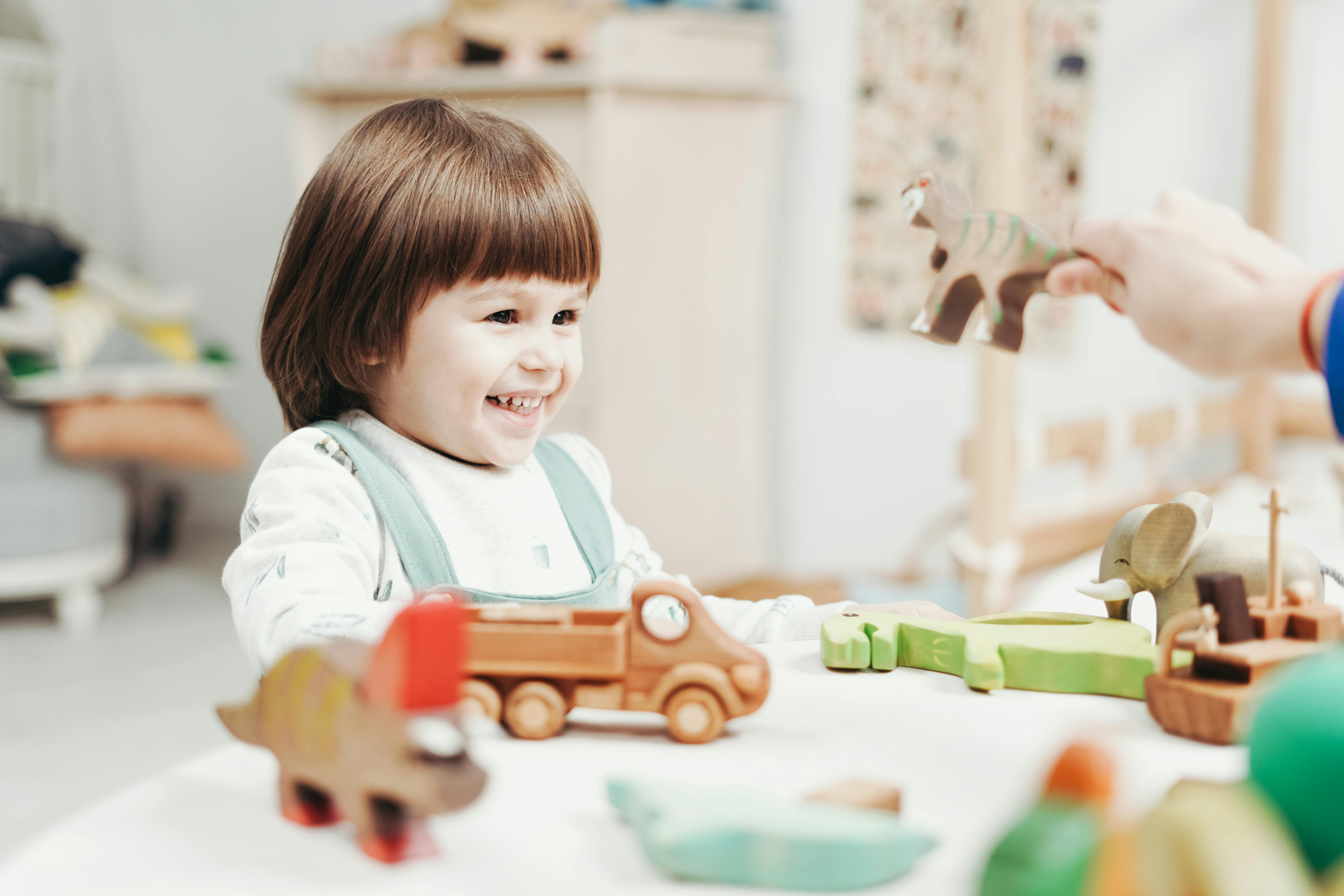 little girl having fun with toys