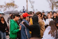 Group of People Comforting Each Other in Gathering