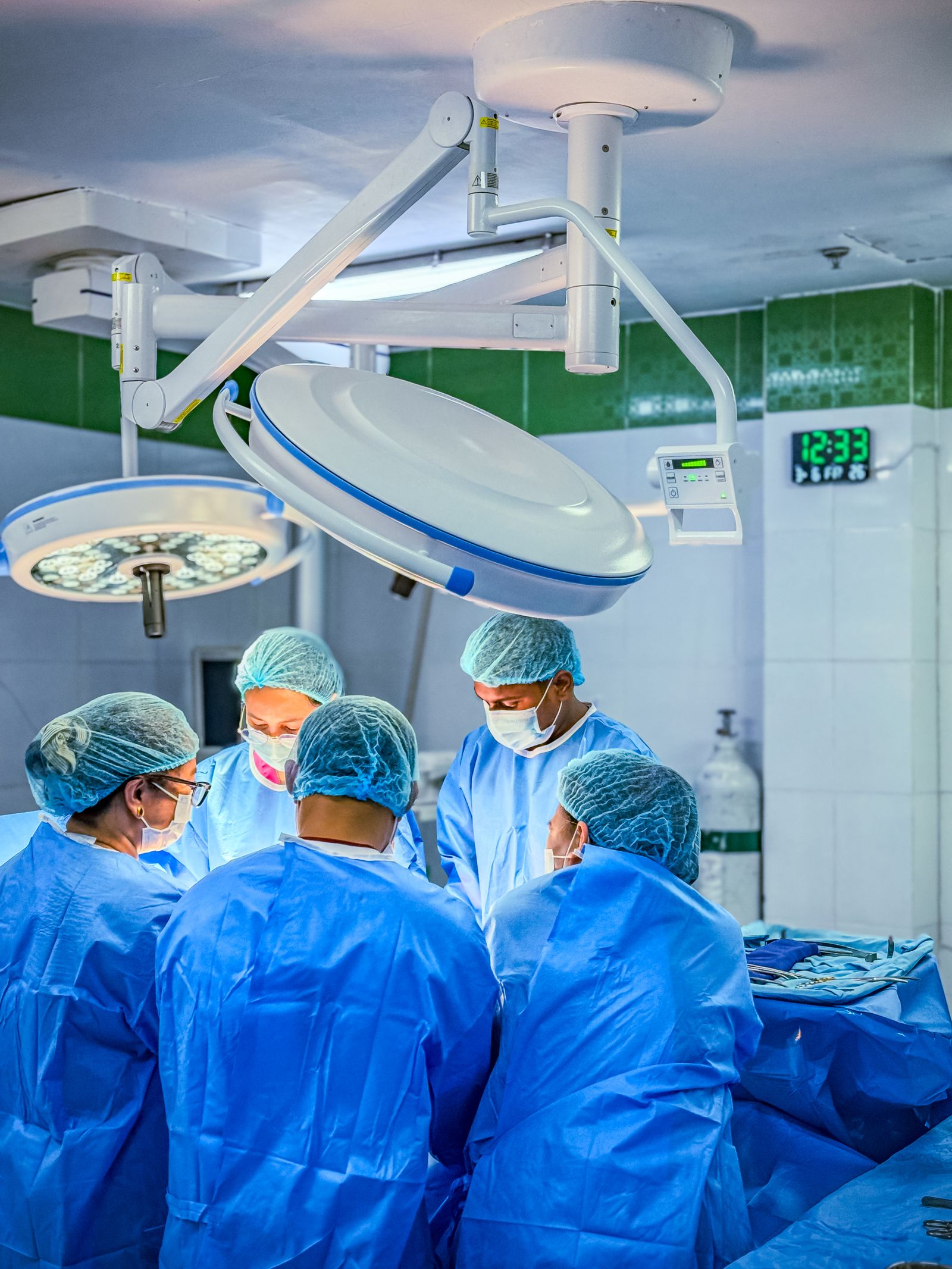 Surgical Team Performing Procedure in Operating Room · Free Stock Photo