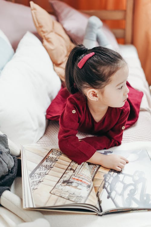 A girl in red looking away