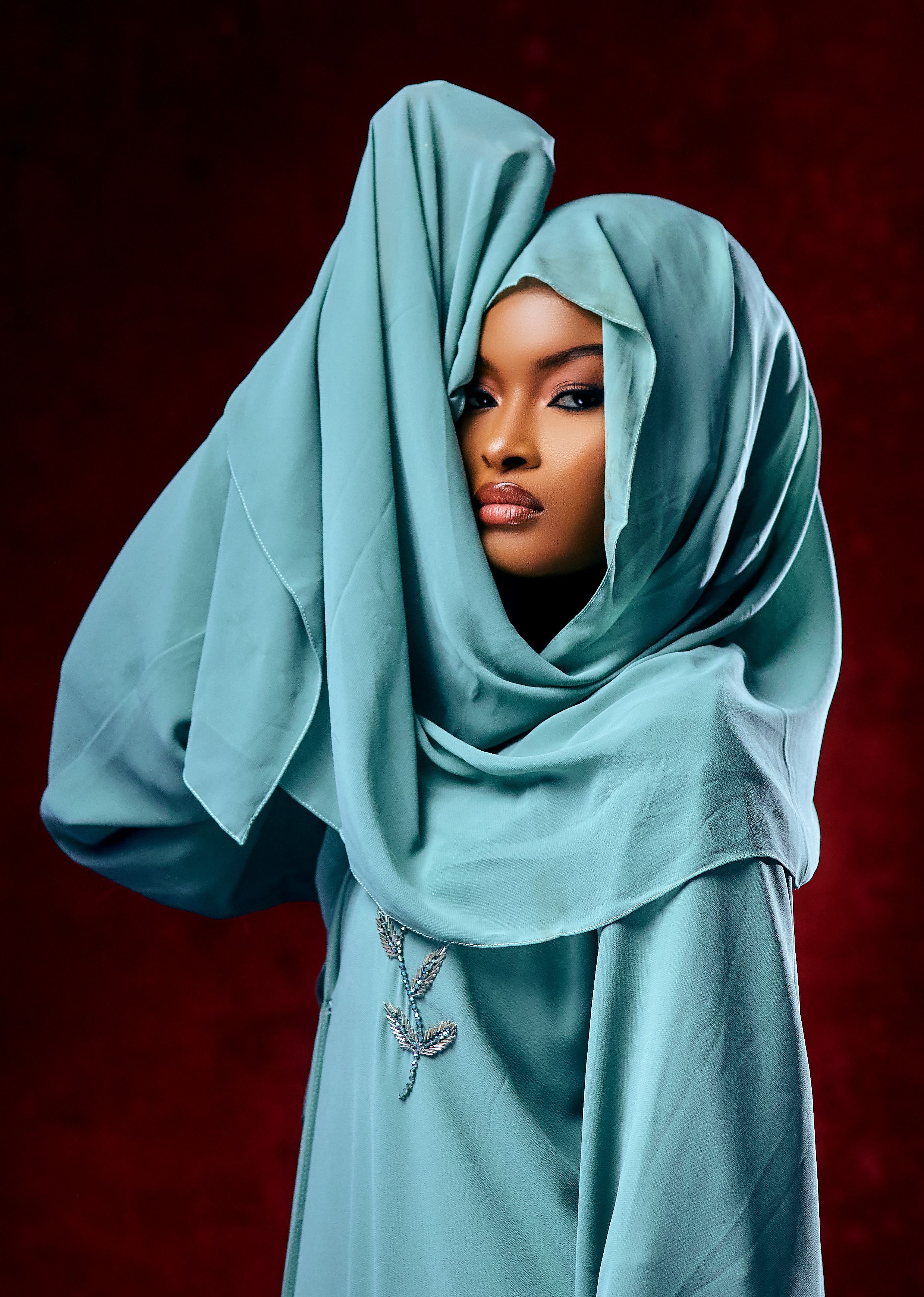 Elegant Portrait of Woman in Blue Hijab · Free Stock Photo