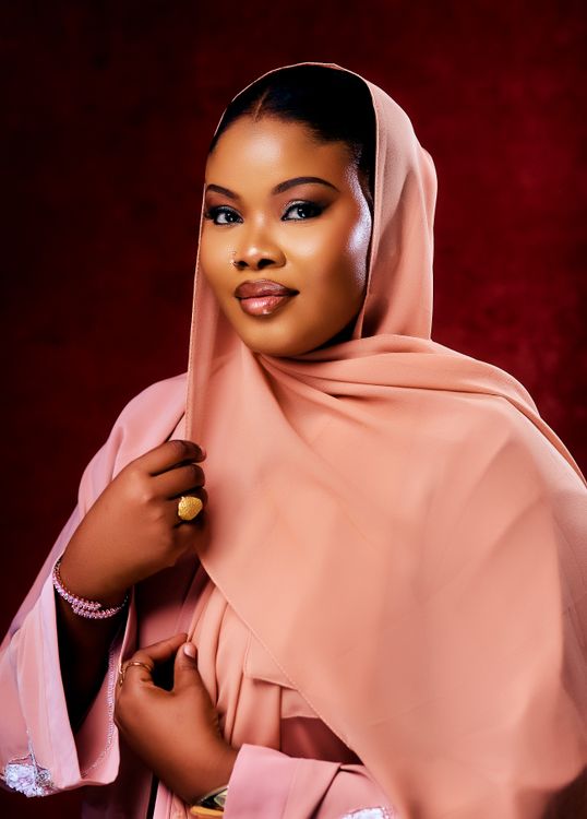 Elegant Woman in Pink Hijab Portrait · Free Stock Photo