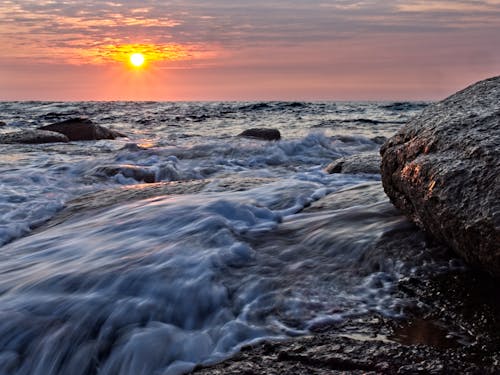 Безкоштовне стокове фото на тему «море, прибій, Світанок»