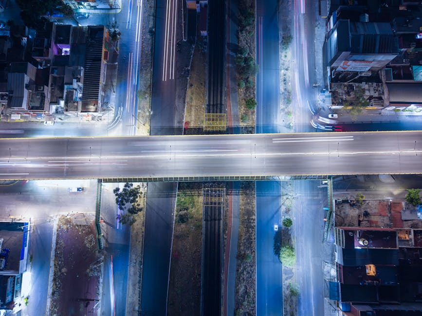 Como Criar um Estilo de Vida Mais Conectado com a Sua Essência 2 Stunning aerial night view of a highway intersection in Ecatepec, Mexico, showcasing urban infrastructure.