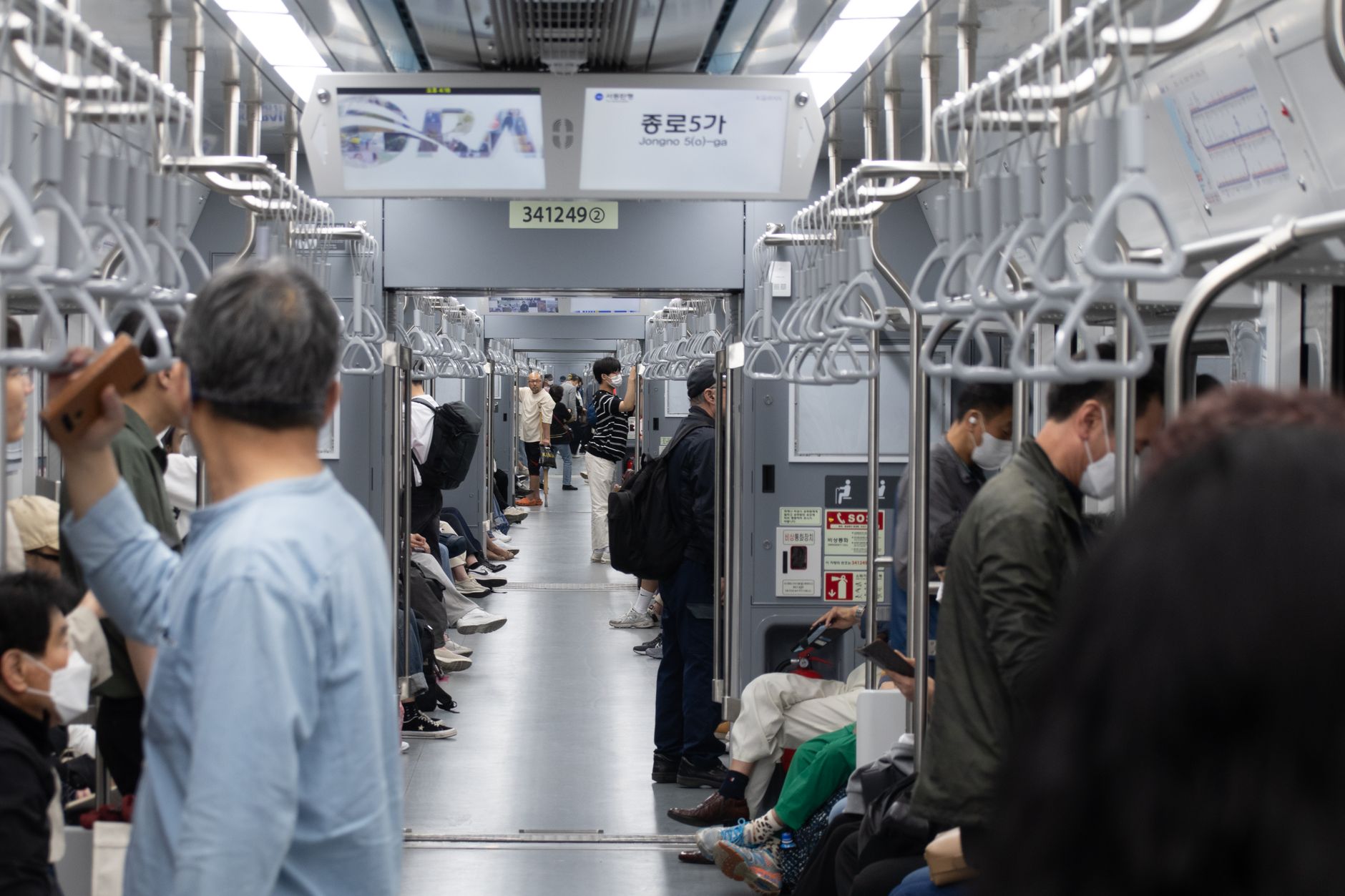 seoul subway summer commuters portable fan