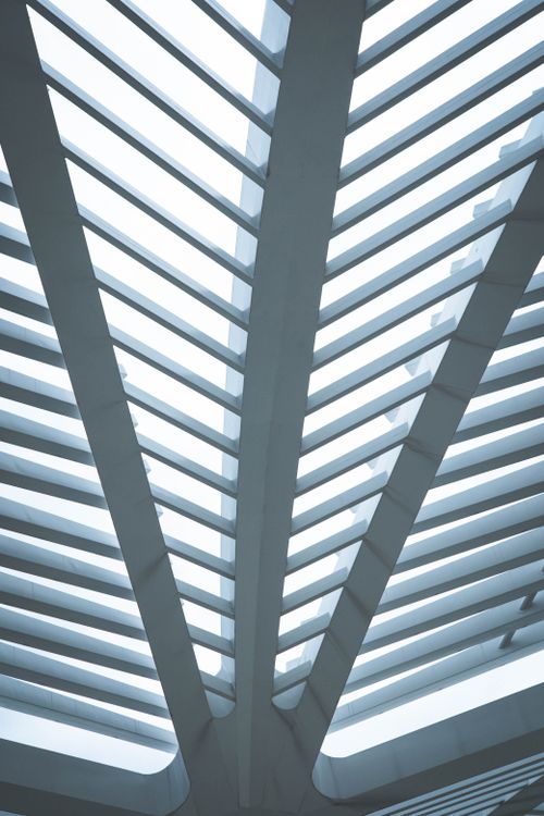 Free Symmetrical design of a contemporary ceiling in a transportation hub, showcasing architectural elegance. Stock Photo