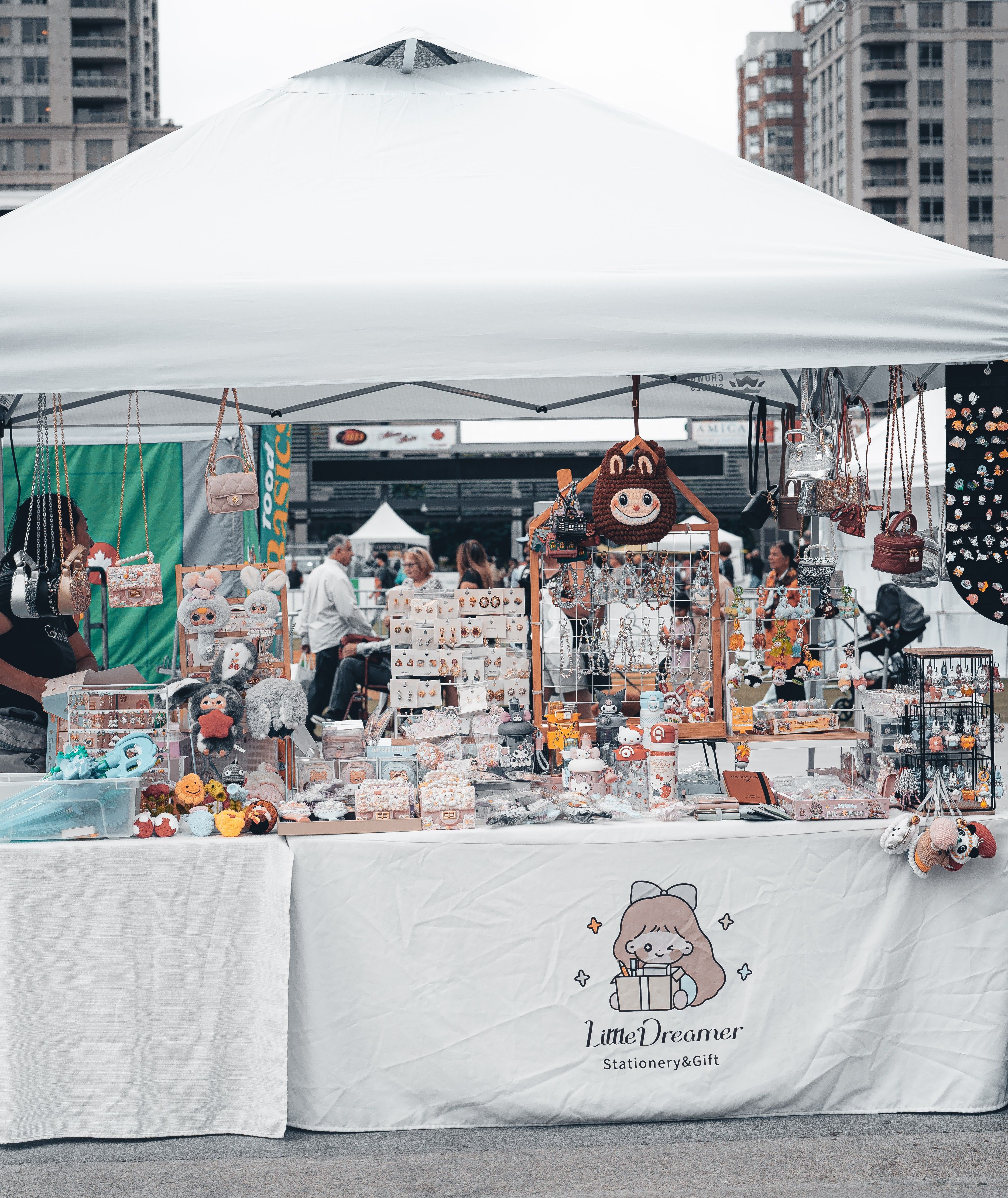 Vibrant Outdoor Street Market Festival Booth Display · Free Stock Photo