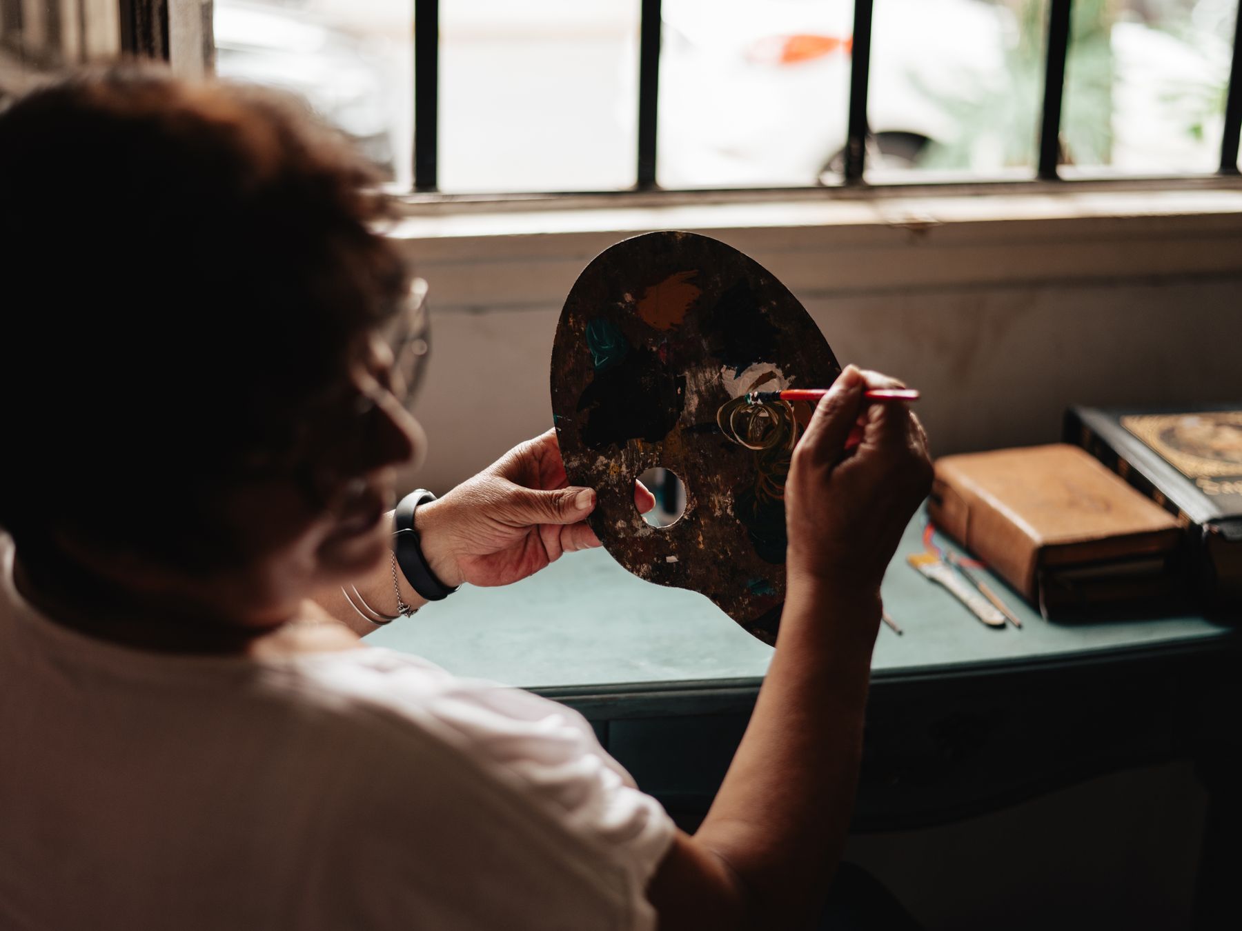 Painters and Decorators in Tokyngton — a decorator at work mid-project