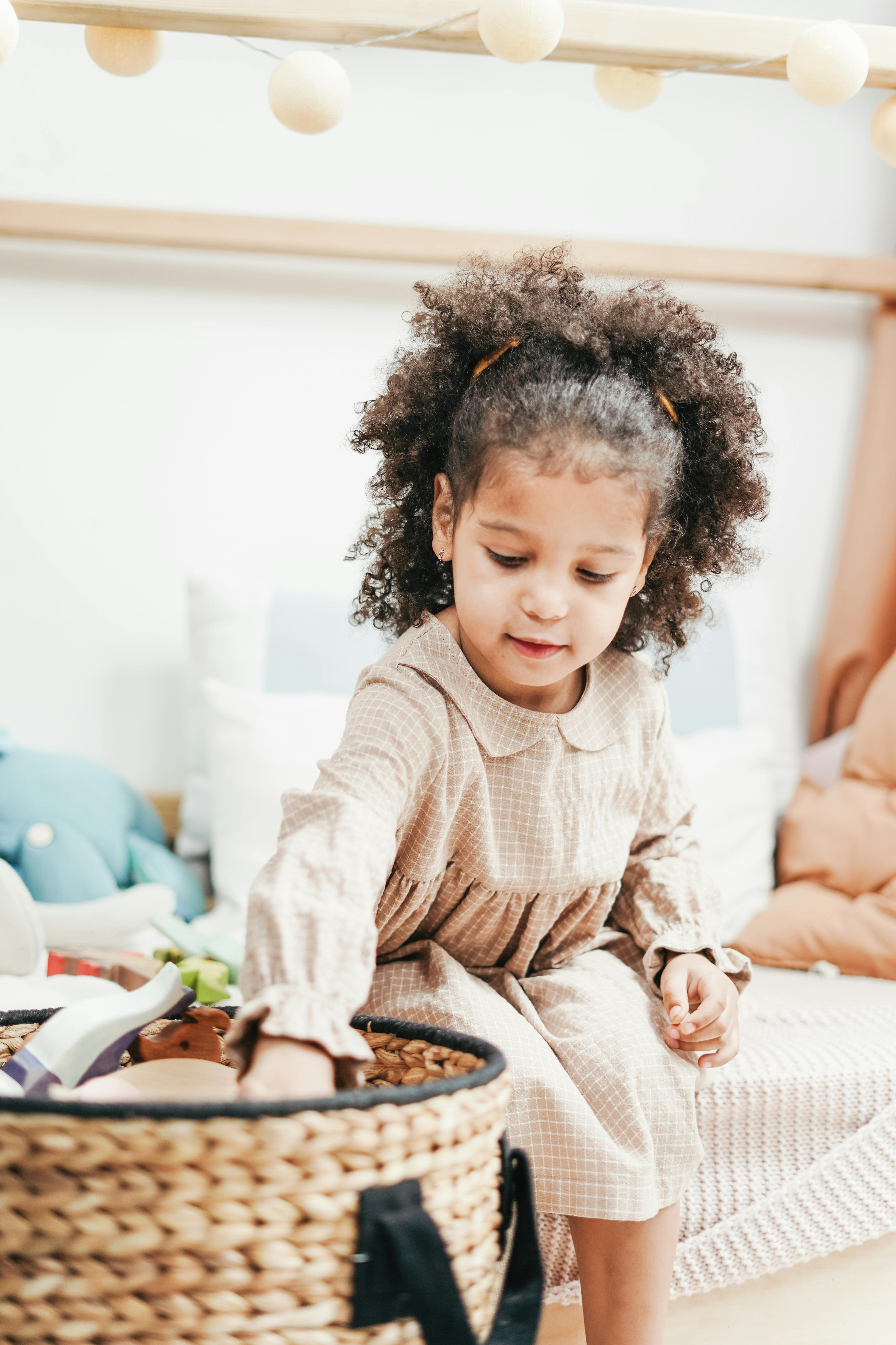 photo of a girl playing her favorite toy