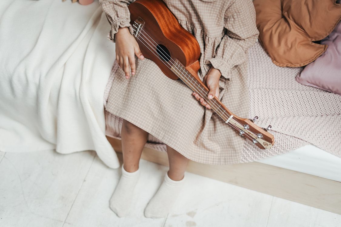 Free Girl Holding Ukelele Stock Photo