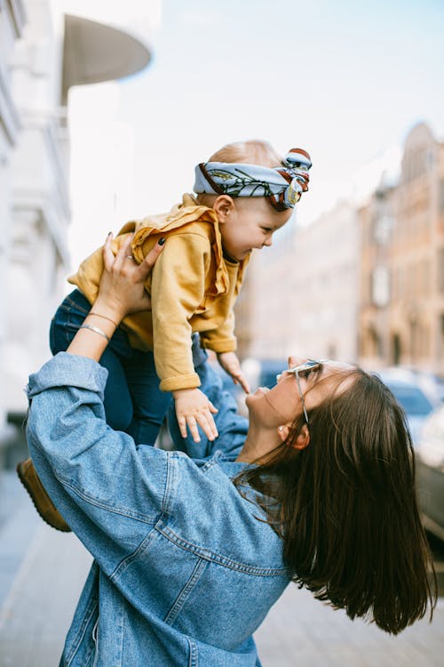 Mother Carrying Her Baby Girl - dating a woman with a child and ex