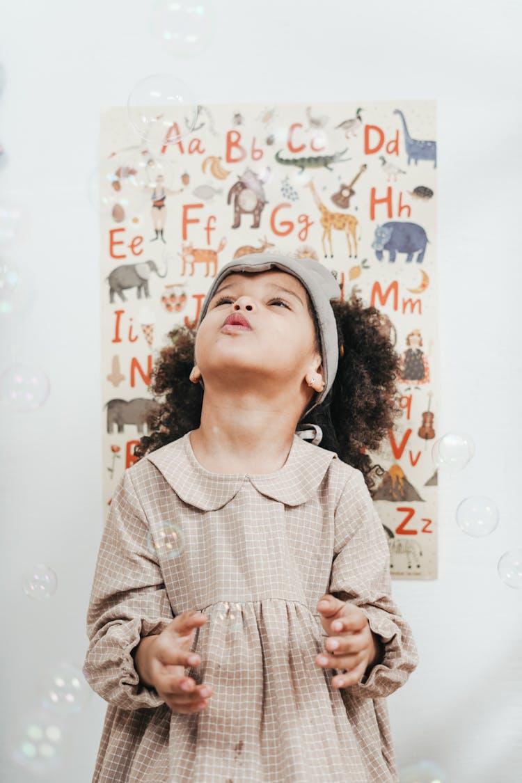 Girl Blowing Bubbles