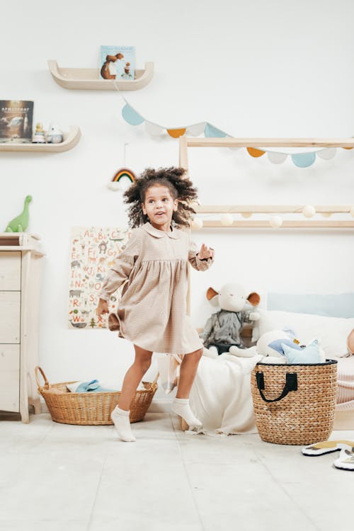 Free Girl Wearing Dress While Having Fun Stock Photo